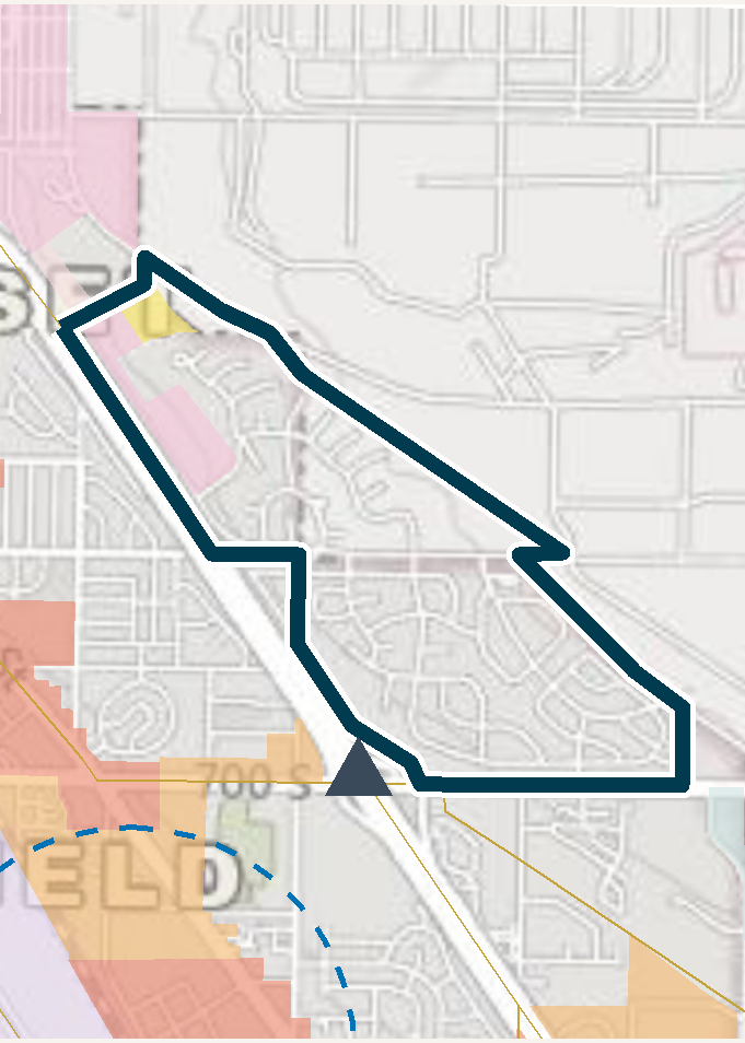 Map of a census tract outlined in dark blue with transit and land-use context.